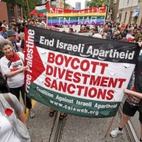 WOW! Watch Anti-Semitic ‘Dyke Marshal” Prevent Pro-Israel Lesbians from Participating in DC Dyke March with Jewish Star on Flag (VIDEO)